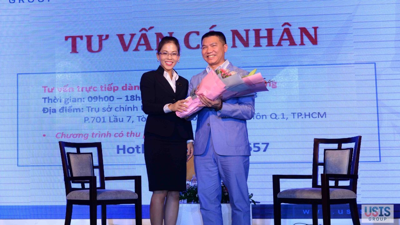 USIS Group CEO giving a bouquet of fresh flower as a sincere thank to Mr. Derrick H. Nguyen